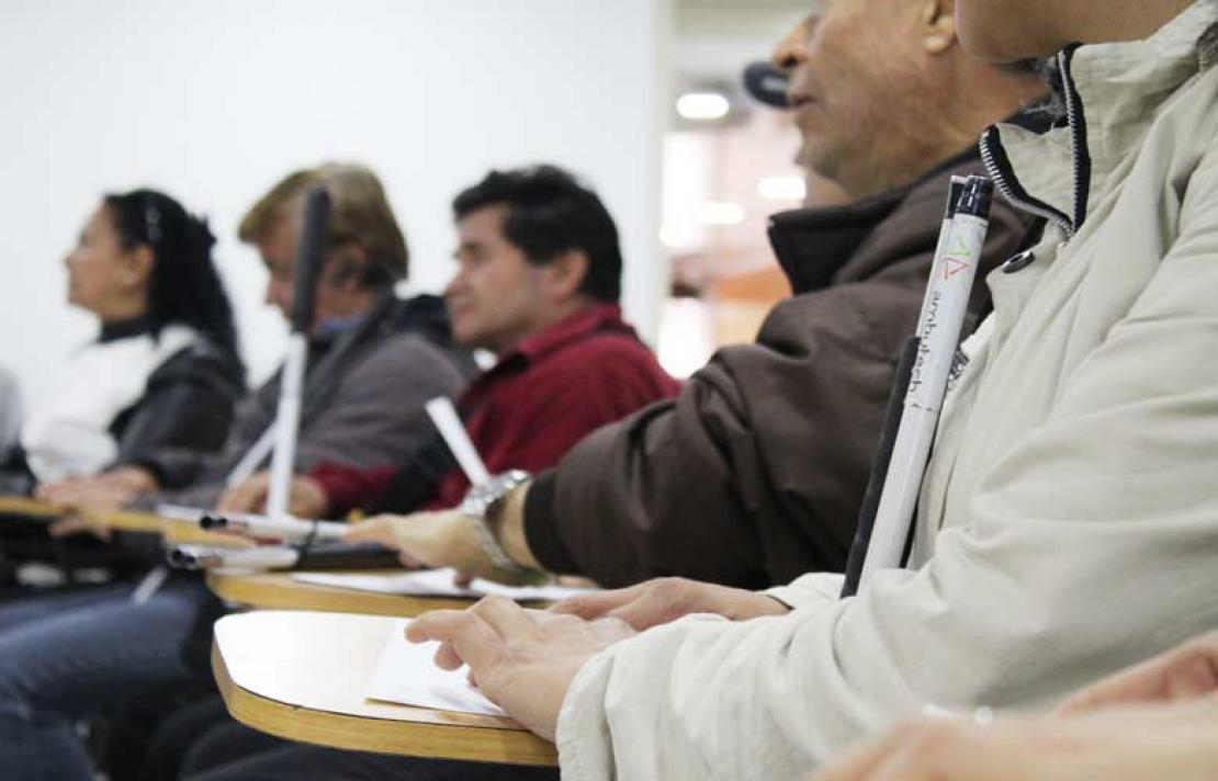 Asistentes al taller de braille