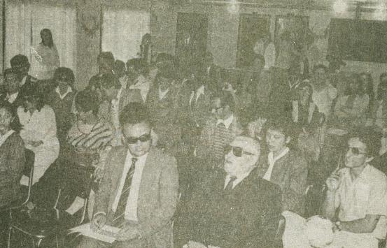 Fotografía, auditorio con personas con discapacidad visual