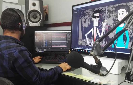 Equipo del INCI haciendo audio descripción
